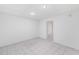 Spacious unfinished basement with tile flooring and an additional room at 6423 Driftwood Dr, Hudson, FL 34667
