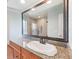 Bathroom boasts granite countertop, large vanity sink, and a walk-in shower at 6423 Driftwood Dr, Hudson, FL 34667
