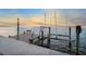 Private boat dock with seating & lift at 6423 Driftwood Dr, Hudson, FL 34667