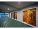 Covered deck with glass doors leading inside at 6423 Driftwood Dr, Hudson, FL 34667