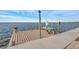 Private dock with seating area and lift for boat access at 6423 Driftwood Dr, Hudson, FL 34667