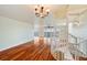 Hardwood floor living room with spiral staircase and water views at 6423 Driftwood Dr, Hudson, FL 34667