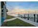 Landscaped pathway leads to private dock at 6423 Driftwood Dr, Hudson, FL 34667