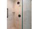 Walk-in shower with beige tile and dual shower heads at 6423 Driftwood Dr, Hudson, FL 34667