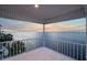 Spacious balcony overlooking the water with sunset views at 6423 Driftwood Dr, Hudson, FL 34667