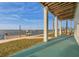 Covered patio with stunning water views and private dock at 6423 Driftwood Dr, Hudson, FL 34667