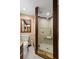 Bathroom with walk-in shower, granite vanity, and toilet at 700 S Prospect Ave, Clearwater, FL 33756