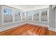 Bright bedroom with hardwood floors and many windows at 700 S Prospect Ave, Clearwater, FL 33756
