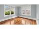 Well-lit bedroom with hardwood floors and gray walls at 700 S Prospect Ave, Clearwater, FL 33756