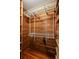 Spacious cedar closet with wire shelving and hanging rods at 700 S Prospect Ave, Clearwater, FL 33756