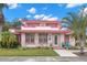 Front view of a charming pink house at 700 S Prospect Ave, Clearwater, FL 33756
