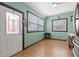 Bright kitchen features light wood flooring and a charming window at 700 S Prospect Ave, Clearwater, FL 33756