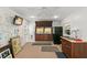 Small kitchenette with sink, refrigerator and cabinets at 700 S Prospect Ave, Clearwater, FL 33756