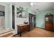 Laundry room with vintage wooden furniture and built-in shelving at 700 S Prospect Ave, Clearwater, FL 33756