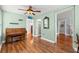 Living room with hardwood floors and piano at 700 S Prospect Ave, Clearwater, FL 33756