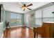 Bright living room with hardwood floors and large windows at 700 S Prospect Ave, Clearwater, FL 33756