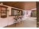 Covered outdoor bar with seating for two at 700 S Prospect Ave, Clearwater, FL 33756