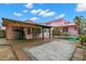 Backyard patio with covered bar and large concrete slab at 700 S Prospect Ave, Clearwater, FL 33756