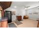 Recreation room with kitchenette and large TV at 700 S Prospect Ave, Clearwater, FL 33756