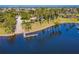 Aerial view of waterfront community with park, dock, and playground at 710 Islebay Dr, Apollo Beach, FL 33572
