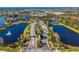 Aerial view of MiraBay community, showcasing lakes, landscaping, and resort-style amenities at 710 Islebay Dr, Apollo Beach, FL 33572