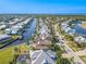 Aerial view of waterfront home in a community with a canal at 710 Islebay Dr, Apollo Beach, FL 33572