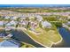 Aerial view of waterfront property with private dock at 710 Islebay Dr, Apollo Beach, FL 33572