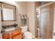 Small bathroom with shower and granite vanity at 710 Islebay Dr, Apollo Beach, FL 33572