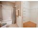 Bathroom with shower tub, toilet and spacious closet at 710 Islebay Dr, Apollo Beach, FL 33572