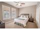 Spacious bedroom with carpeted floors and window shutters at 710 Islebay Dr, Apollo Beach, FL 33572
