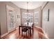 Bright dining room features a charming table and bay window at 710 Islebay Dr, Apollo Beach, FL 33572