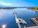 Docks with kayaks and paddleboards on calm water at 710 Islebay Dr, Apollo Beach, FL 33572