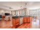 Eat-in kitchen with hardwood floors and open concept design at 710 Islebay Dr, Apollo Beach, FL 33572