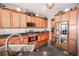 Modern kitchen with stainless steel appliances and granite counters at 710 Islebay Dr, Apollo Beach, FL 33572