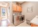Bright laundry room with modern appliances at 710 Islebay Dr, Apollo Beach, FL 33572