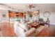 Open concept living room with kitchen and staircase views at 710 Islebay Dr, Apollo Beach, FL 33572