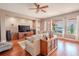 Spacious living room with water views and hardwood floors at 710 Islebay Dr, Apollo Beach, FL 33572