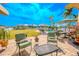 Peaceful patio with seating and backyard view at 710 Islebay Dr, Apollo Beach, FL 33572