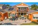 A bird's eye view of the home's inviting patio and pool area at 710 Islebay Dr, Apollo Beach, FL 33572