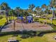 playground with swings and play structures at 710 Islebay Dr, Apollo Beach, FL 33572