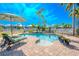 Inviting kidney-shaped pool in backyard at 710 Islebay Dr, Apollo Beach, FL 33572
