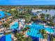 Aerial view of resort-style pool and surrounding landscape at 710 Islebay Dr, Apollo Beach, FL 33572