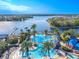 Aerial view of the resort-style pool and surrounding waterfront at 710 Islebay Dr, Apollo Beach, FL 33572