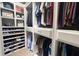 Large walk-in closet with ample shelving and hanging space at 710 Islebay Dr, Apollo Beach, FL 33572