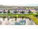 Aerial view of the property, showcasing its backyard pond at 11902 Greengate Dr, Hudson, FL 34669