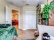 Bedroom with access to a lower level and a large closet at 11902 Greengate Dr, Hudson, FL 34669