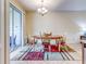 Dining area with an oval table and chairs at 11902 Greengate Dr, Hudson, FL 34669
