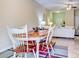 Dining room with oval table and four chairs at 11902 Greengate Dr, Hudson, FL 34669