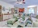 Bright living room with comfy sofas and a coffee table at 11902 Greengate Dr, Hudson, FL 34669