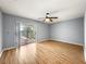 Main bedroom with sliding glass doors to the pool area at 10454 Ventura Dr, Spring Hill, FL 34608